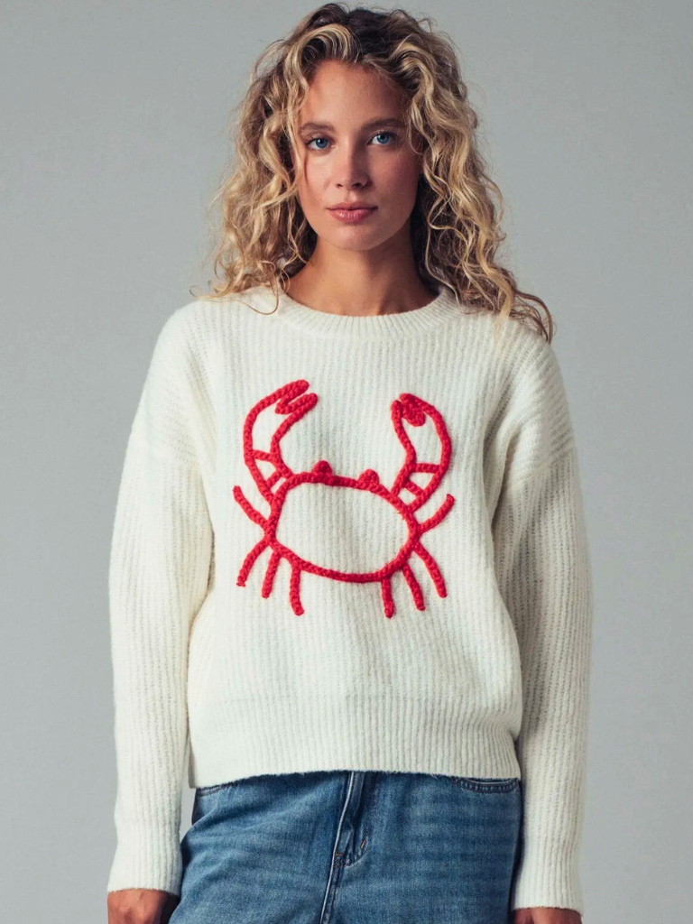 Feelin' Crabby Chunky Knit Embroidered Sweater, on Model Close Up View, Embroidered Yarn, Bold Red Crab Motif on an Ivory Sweater.