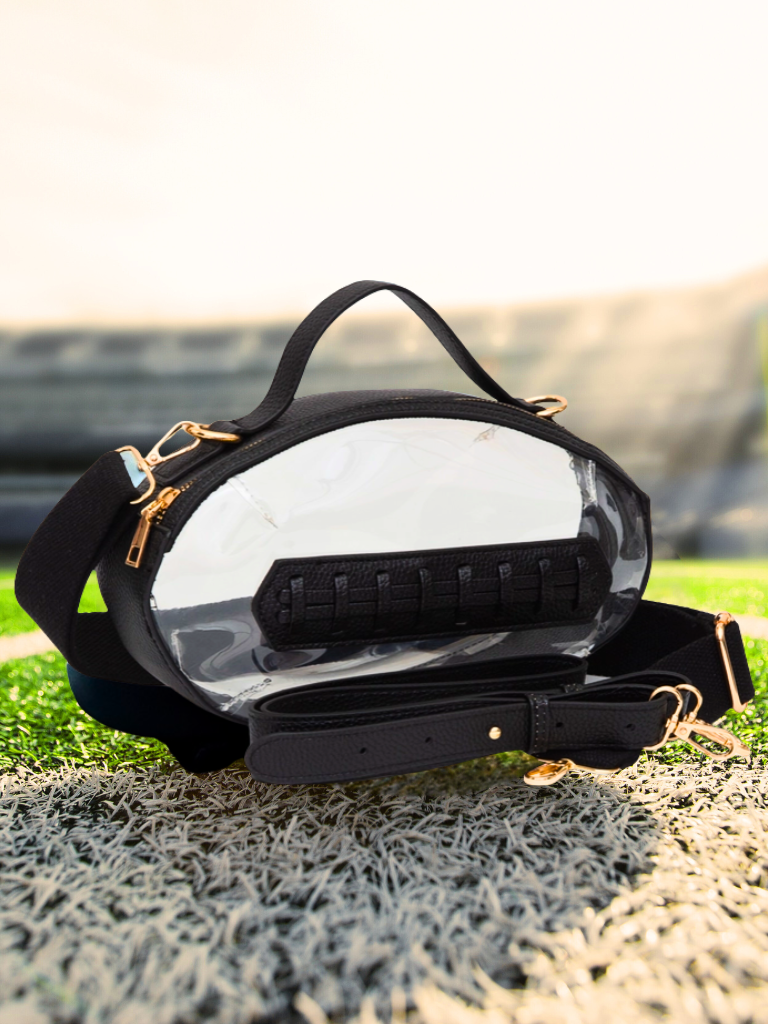 Football Shaped Clear Crossbody Purse with Interchangeable Strap Capability.  Full front view.