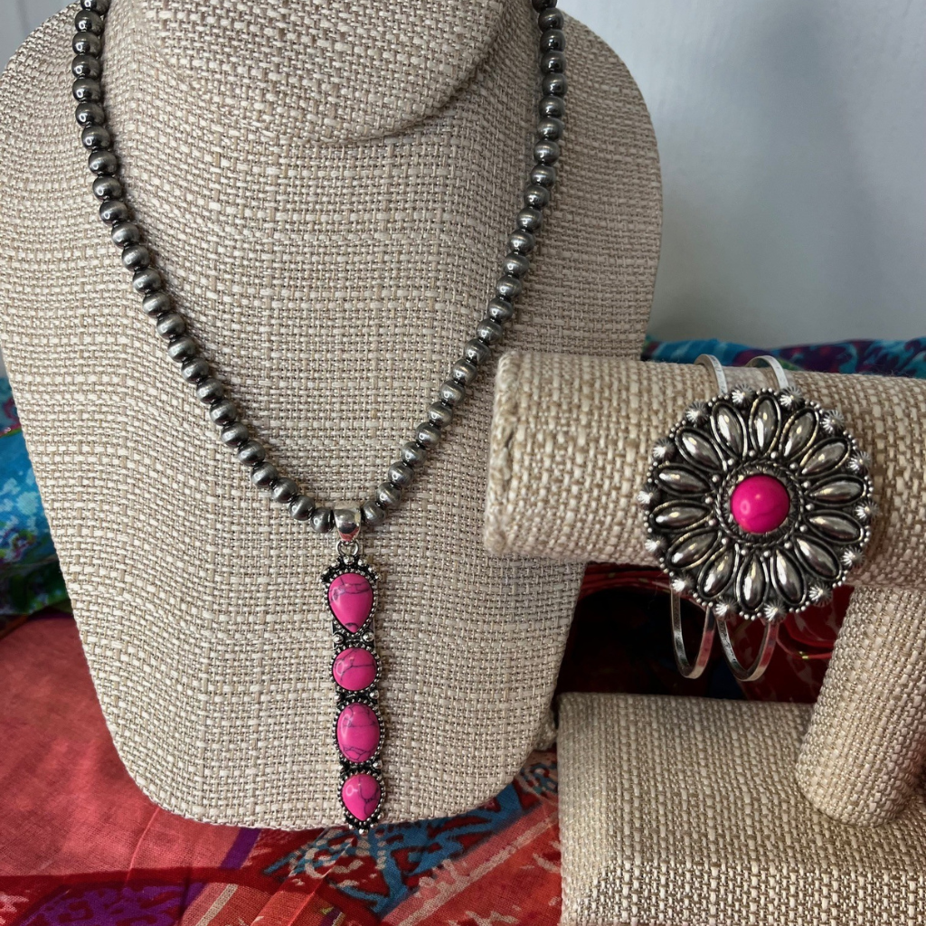 Navajo Boho Style Concho Bracelet and Pendant Necklace - Fuchsia Stones in Burnished Silvertone Setting. Sitting on top of Sarong.