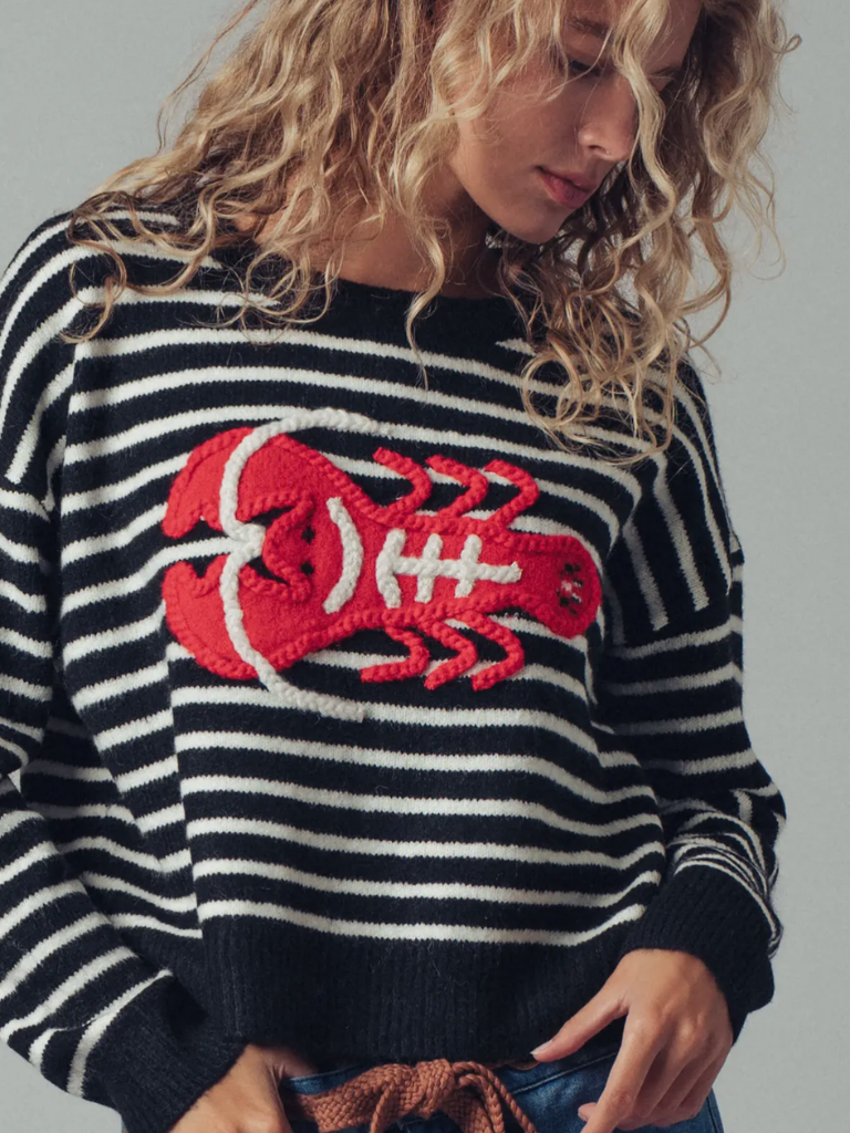 Lobster Love Striped Ladies Sweater on Model, Front View, Close Up, Black and white Stripes with Bold Red Embroidered Yarn Lobster Motif