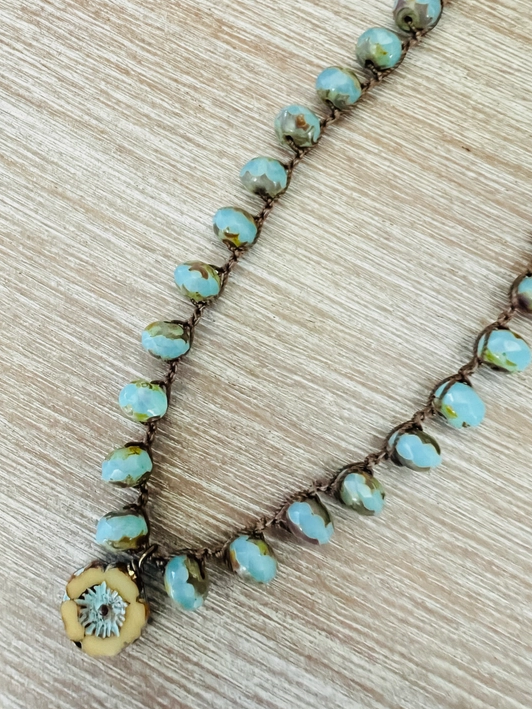 Sand and Sky Pressed Glass Crystal Flower Necklace. Shows Single Necklace