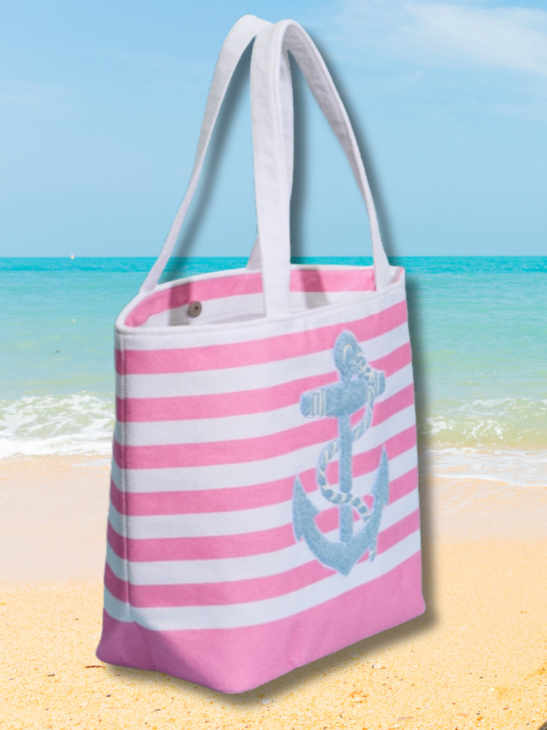 Anchored in Pink Beach Tote Bag with a Chenille Blue Anchor Embroidered on to Bag, Side View Shown.