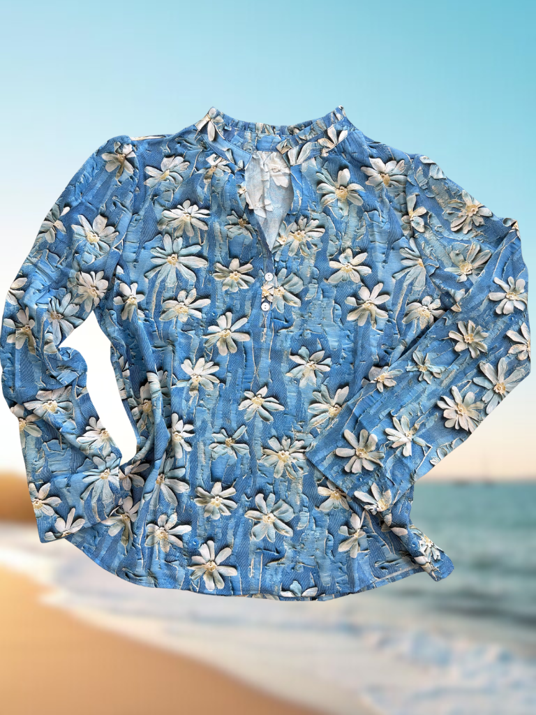 Boho Blue Floral Blouse Flat Lay Front View with Beach Background.