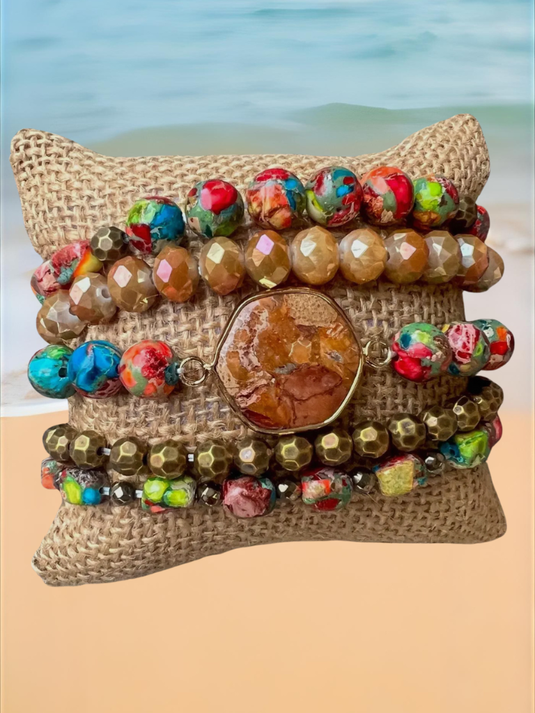 Earth & Ember Boho Stack Gemstone Stack Bracelet, Multi-color Stones, Front View Slightly Angled, Shown Wrapped Around a Mini Pillow.