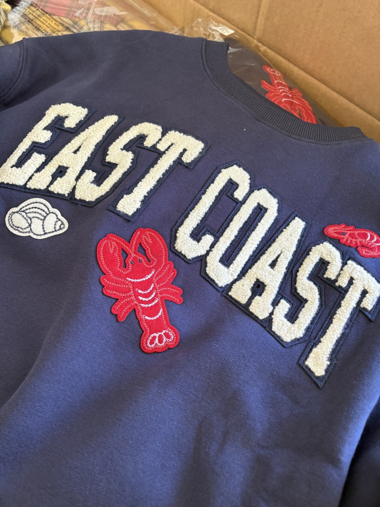 East Coast Lobster Crew, Appliqué, Ladies Sweatshirt, Laid Flat, Very Close Up View