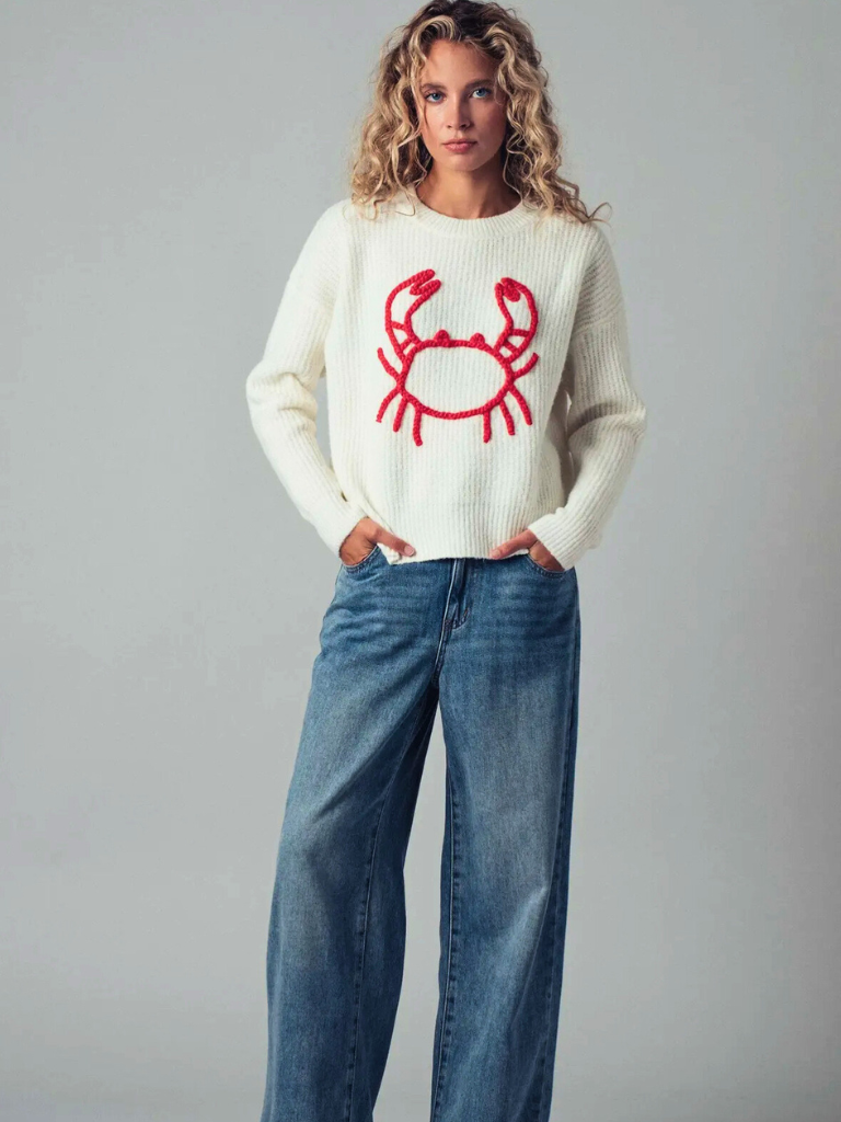 Feelin' Crabby Chunky Knit Embroidered Sweater, Full  Height View on Model, Embroidered Yarn, Bold Red Crab Motif on an Ivory Sweater.