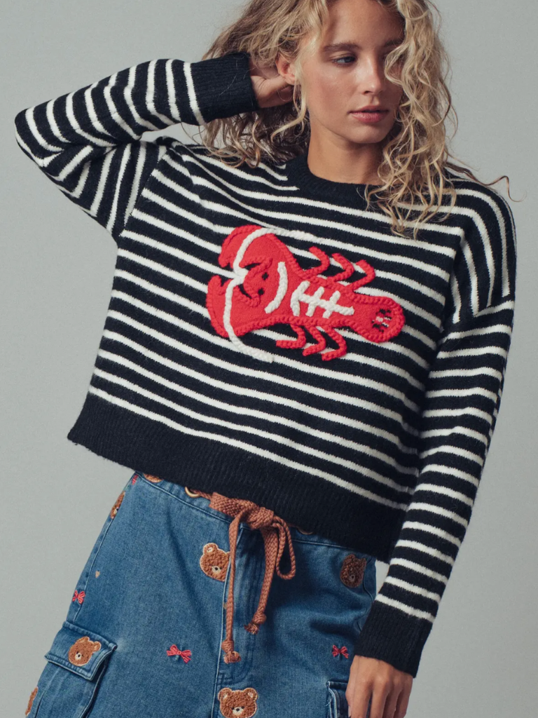 Lobster Love Striped Ladies Sweater on Model, Front View, Close Up, Black and white Stripes with Bold Red Embroidered Yarn Lobster Motif 