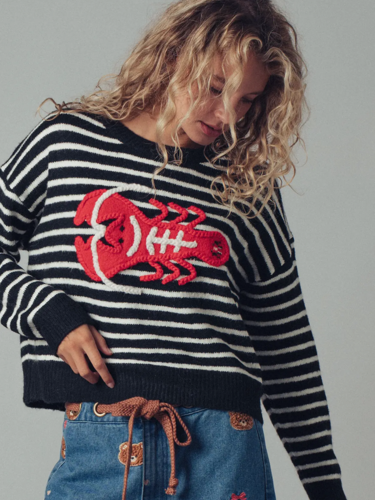 Lobster Love Striped Ladies Sweater on Model, Front View, Close Up, Black and white Stripes with Bold Red Embroidered Yarn Lobster Motif 