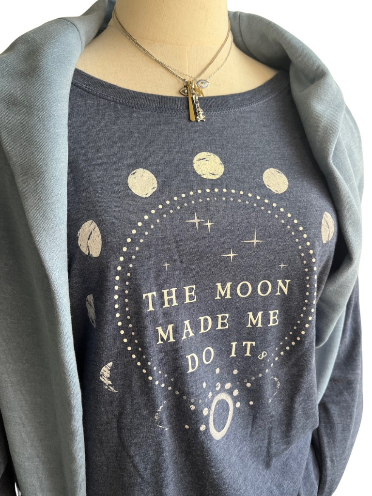The Moon Made Me Do It Angled Front View with Sweatshirt and Necklace. Closer Up