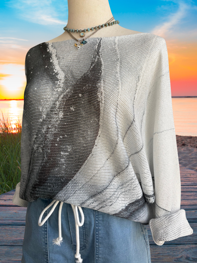 Shades of Grey Tie Dye, Round Neck, Loose Knit Ladies Sweater on Form, Closer Up Angled View.  Same Shorts and Necklaces.