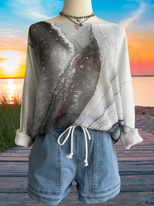 Shades of Grey Tie Dye, Round Neck, Loose Knit Ladies Sweater Full Front View on a Form, Wearing our Weekend Wanderer Shorts with Eyes of Protection Necklace, and Sand and Sky Pressed Glass Crystal Flower Necklace.