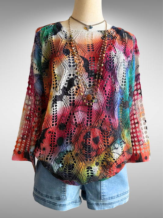 Spooky Soul Boho Halloween Sweater on Form with the Earth and Ember Necklace, the Eyes of Protection Necklace and Weekend Wanderer Shorts