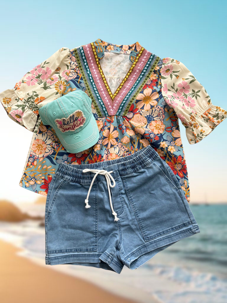 Sunset Bloom Crochet Trim Boho Blouse Flat Lay with Weekend Wanderer Boat Shorts and Hello Sunshine Hat