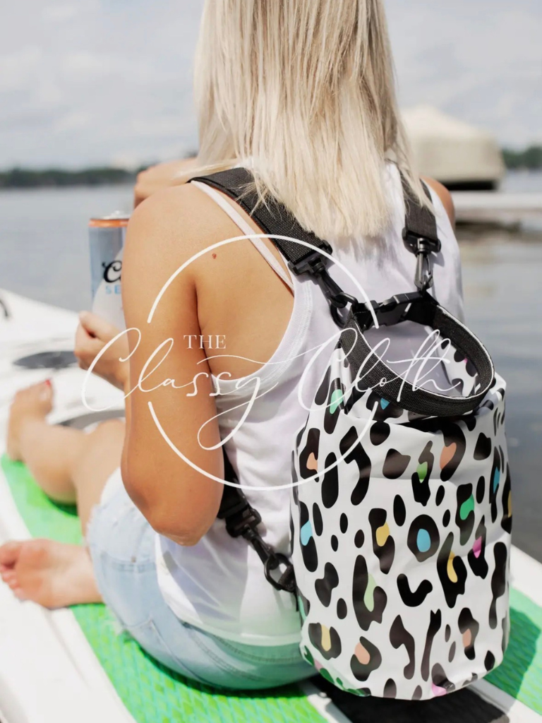 Vibrant Leopard Waterproof 5L Dry Bag on Model on Paddle Board